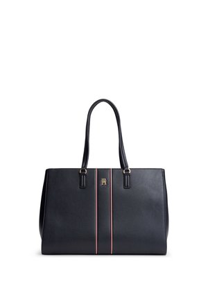 Sac cabas en cuir noir avec deux poignées, logo doré et bandes verticales rouges, blanches et noires au centre.