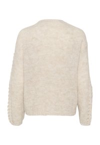 Beige knitted sweater with long sleeves, featuring textured detailing along the edges and a relaxed fit. Back view showcases a boxy design.