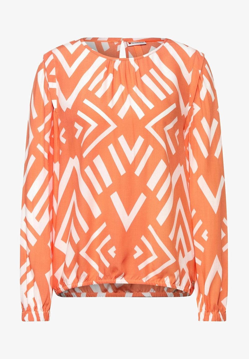 Long-sleeve blouse in coral with white geometric pattern, featuring a round neckline and gathered hemline for a relaxed fit.