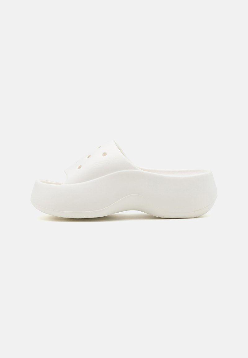 White slip-on clogs with a rounded toe, smooth texture, and ventilation holes. Curved, contoured sole for comfort.