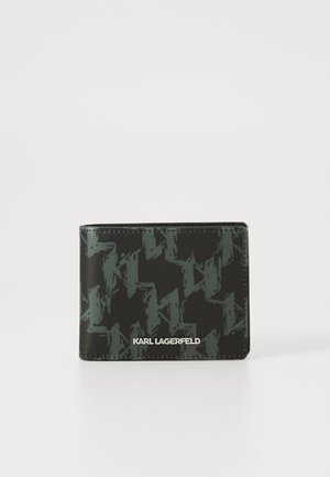 Portefeuille noir avec une finition texturée, présentant un design à motifs en vert foncé. Logo "KARL LAGERFELD" en blanc en bas. Format compact.