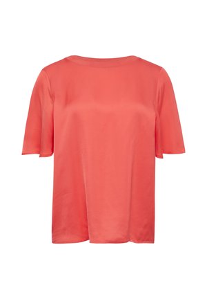 Coral red short-sleeved top made of smooth fabric with a round neckline and relaxed fit. No patterns or hardware details visible.