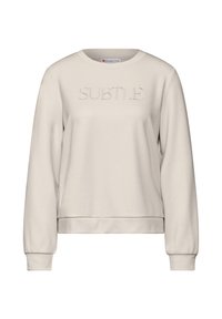 Ljusbeige sweatshirt i mjukt material, med en texturerad "SUBTLE"-tryck framtill, rund halsringning och ribbstickade muddar.