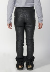 Koroshi Tajice-hlače - black
