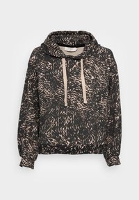Sudadera con capucha en tela negra con patrón abstracto en crema. Presenta cordones, puños acanalados y un ajuste relajado. Textura suave.