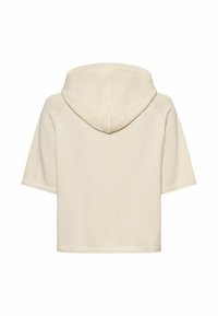 Krótka beżowa bluza z kapturem i krótkimi rękawami. Gładka faktura i luźny krój, z centralnym szwem z tyłu, bez nadruków.