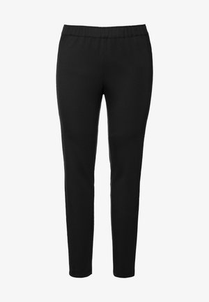 Black, stretchy pants with an elastic waistband. Smooth texture and fitted shape at the ankles, suitable for casual wear.