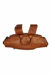 Brown leather bag with dual shoulder straps, top handle, and zip closure. Features smooth texture and rounded shape.