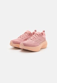 Pink athletic shoes with a mesh upper and rubber sole, featuring a rounded shape, padded collar, and textured outsole for traction.