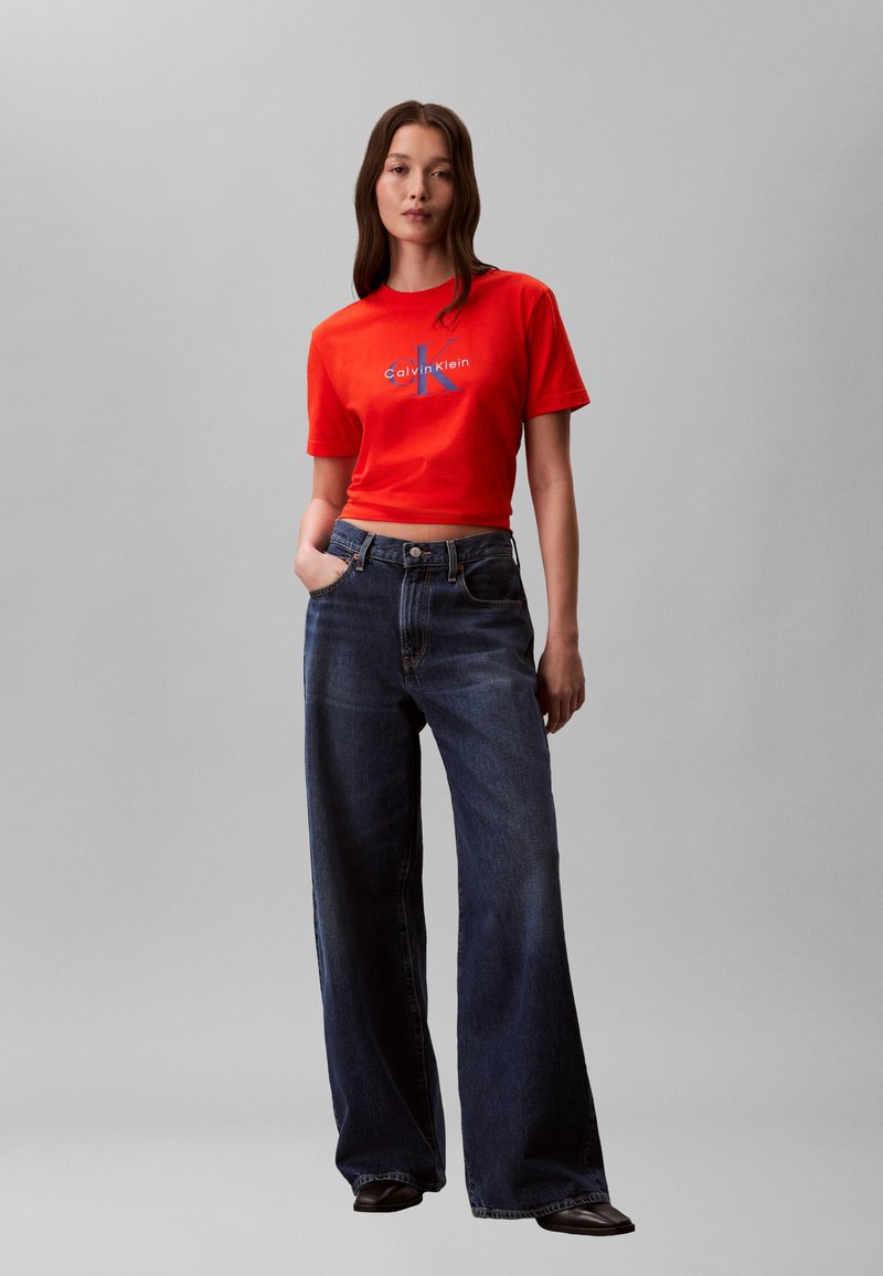 Calvin Klein Jeans HERO CLASSIC MONOLOGO - Triko s potiskem - orange