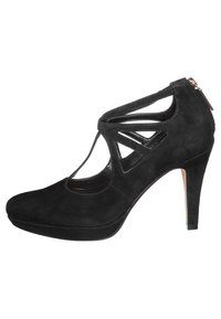 Černá semišová vysoká podpatková bota s vyřezávaným designem a zadním zipem. Obsahuje zaoblenou špičku a štíhlý podpatek pro zvýšení.