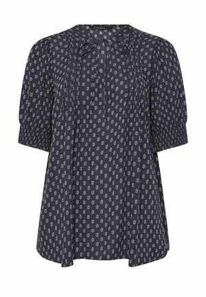 Marineblå bluse med hvidt blomsterprint, korte pufærmer, smockmanchetter, forreste plisseringer og en lille sløjfe ved den runde udskæring.