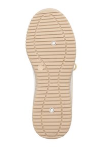 Sohle eines Sneakers, mit strukturiertem Gummi, vertikalen und horizontalen Rillen, in hellbeige und zwei runden Stollen für Traktion.