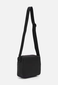 Tommy Hilfiger UNISEX - Borsa a tracolla - black