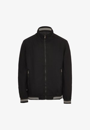 Black zip-up jacket with a stand-up collar, featuring striped cuffs and hem, two side pockets, and a smooth, lightweight fabric.