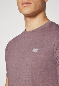 New Balance ESSENTIALS - Camiseta deportiva - mauve