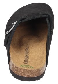 Schwarze Slipper-Sandale mit strukturiertem Obermaterial, Kork-Innensohle und Gummisohle. Enthält einen kleinen Riemen und ein Markenlogo.