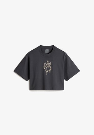 Abgeschnittenes schwarzes T-Shirt aus Baumwolle mit rundem Halsausschnitt. Besitzt ein goldenes Flammenherz-Motiv in der Mitte. Kurze, weite Ärmel.