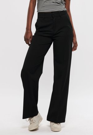 LUCY-M - Trousers - black