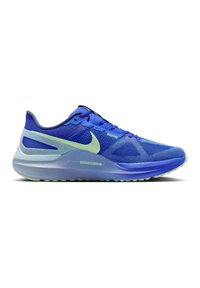 Scarpa ginnica blu con tomaia in rete, caratterizzata da un logo Swoosh verde chiaro, superficie testurizzata e suola ammortizzata con battistrada a disegno.