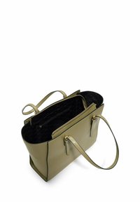 Sac fourre-tout en cuir vert avec une forme structurée, deux poignées et un intérieur à motif hexagonal noir. Équipé de quincaillerie et d'une fermeture éclair en ton doré.