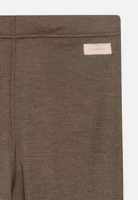 Sanetta UNISEX - Legingi — bikses - beige