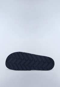 Navy blue rubber shoe sole with a textured, zigzag pattern for traction. Rounded toe and flat design. Smooth surface with an even finish.