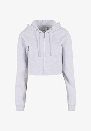 Helehall kärbitud kapuutsiga dressipluus, mis on valmistatud pehmest kangast, esiküljel tõmblukk, reguleeritavad tõmbelindid ja esitaskud. Lihtsa logoga detail.