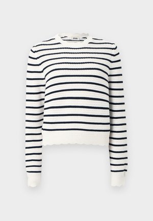 Pulover croșetat cu dungi orizontale albastre și albe. Guler rotund, mâneci lungi și detaliu cu tiv ondulat.