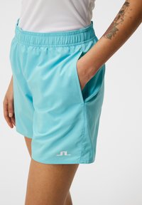 J.LINDEBERG Sports PRICILLA SHORTS - Sporta šorti - blue curacao