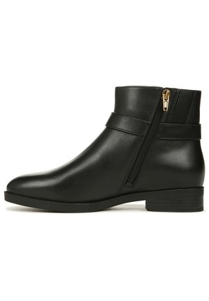 Black leather ankle boot with a rounded toe, side zipper with gold hardware, and a low block heel. Smooth texture and sleek design.