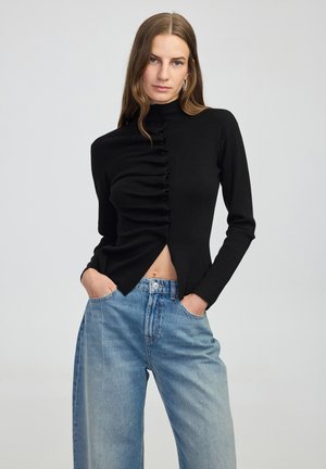 ASYMMETRIC - Vest - black