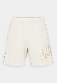 Ei valittu, light orewood brown/pale ivory