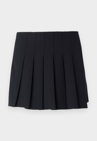 Black pleated skirt made from soft fabric. Features vertical seams and an elastic waistband for comfort. Mid-thigh length, minimalistic design.