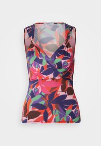 Haut sans manches avec un motif floral vibrant en rouge, violet et vert. Tissu lisse avec un design croisé et des accents en anneau métallique.