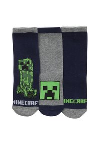 Three pairs of crew socks featuring Minecraft characters. Colors include navy, gray, and green. Designs include a Creeper and pixel art accents.
