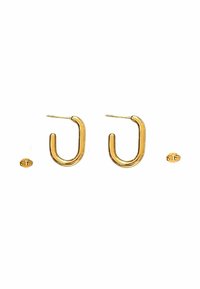 Pendientes de aro en tono dorado con forma de U, que presentan una textura suave y un poste delgado. Incluyen un pequeño respaldo circular.