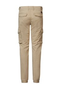 Pantalon cargo beige à coupe fuselée, doté de multiples poches cargo, de poignets élastiques et d'une texture lisse en mélange de coton.