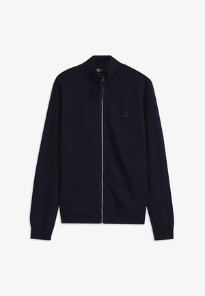 Chaqueta azul marino con cremallera, confeccionada en tela suave. Cuenta con un cuello alto, puños elásticos y un logo minimalista en el pecho.