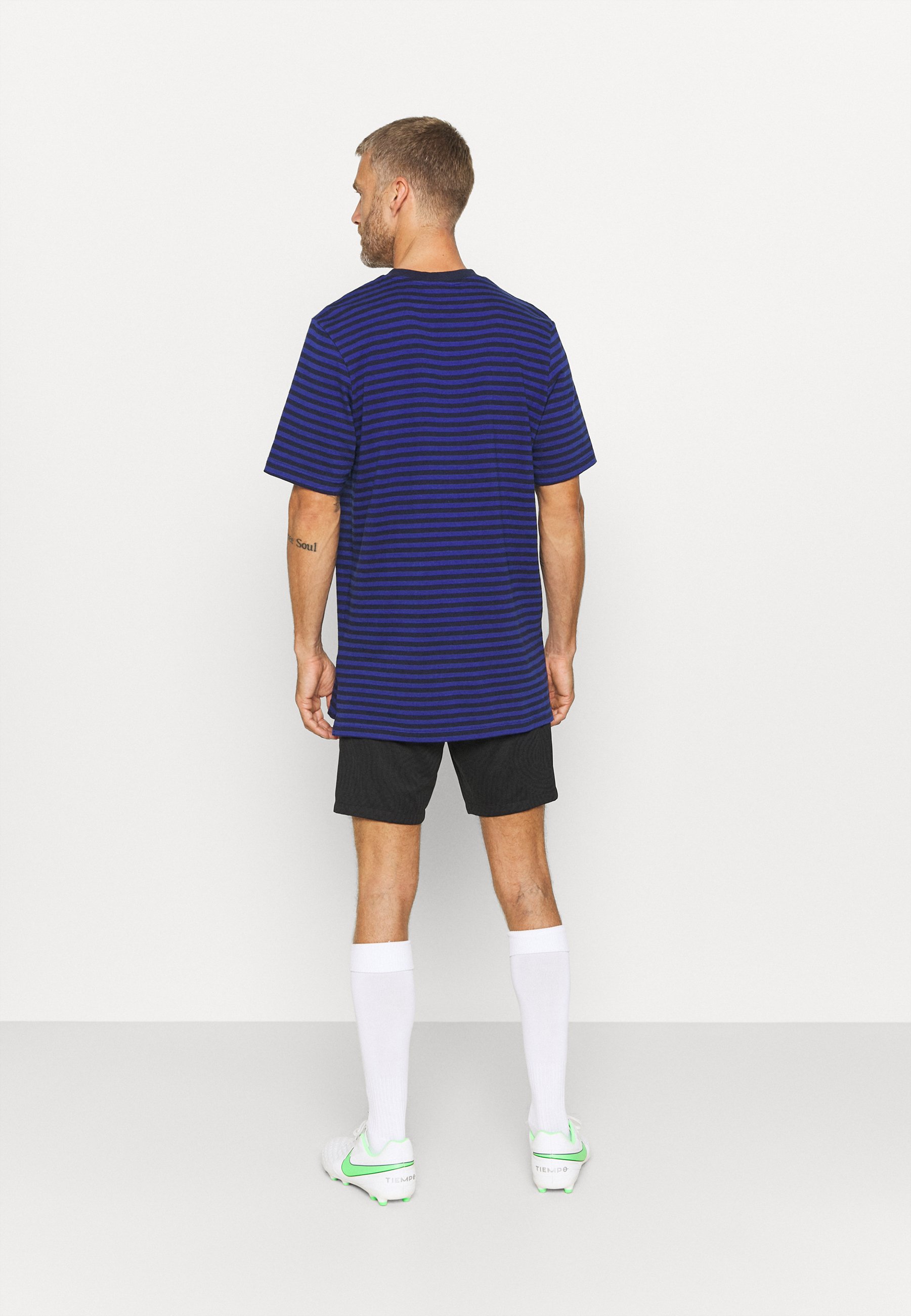 royal blue and red nike shirt