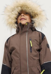 Áhkká OVERALL SOLID WASSERDICHT UND WATTIERT - Skioverall / Skidragter - braun