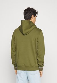 Tommy Hilfiger MONOTYPE COLLEGIATE HOODIE - Felpa - putting green