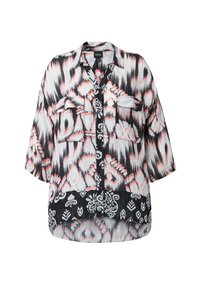 Lightweight, button-up shirt featuring a black and white ikat pattern with coral accents, two chest pockets, and a curved hem.