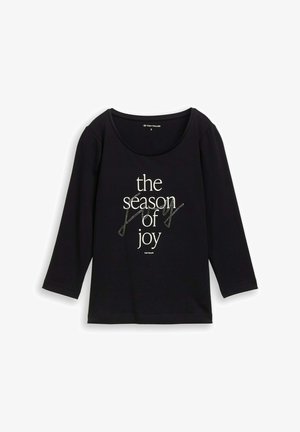 Sort langærmet t-shirt med teksten "sæsonen for glæde" i hvid og dekoreret med funklende detaljer. Rund halsudskæring.