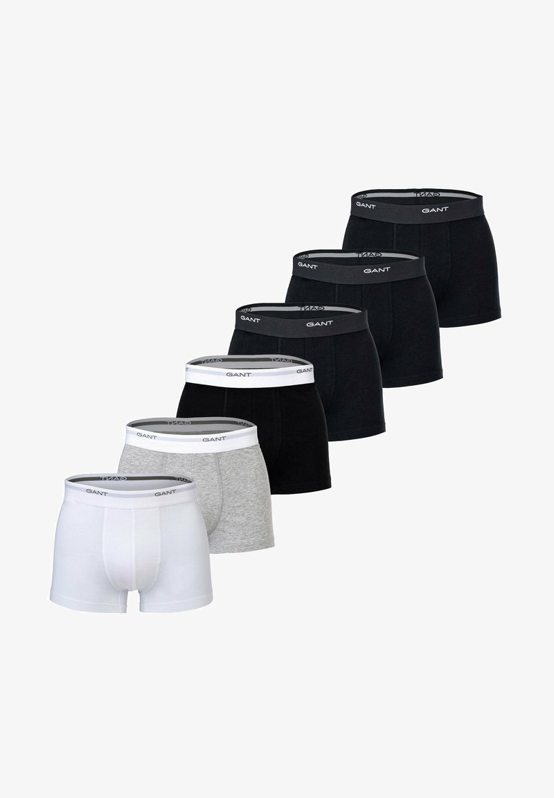 Herrenboxershorts in Schwarz, Grau und Weiß. Baumwollmaterial, elastischer Bund mit dem Aufdruck "GANT", eng anliegendes Design, insgesamt fünf Stück.