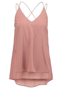 Camisole rose poussiéreux sans manches avec fines bretelles croisées et ourlet superposé légèrement asymétrique.
