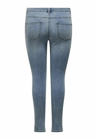 Jeans de denim azul ajustados con una textura suave, que cuentan con una cintura a media altura, cinco bolsillos y un acabado limpio sin desgaste visible.