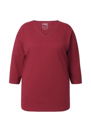 Burgundské tričko s výstřihem do V a tříčtvrtečními rukávy, vyrobené z měkké bavlny. Má volný střih a minimální švy.