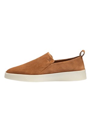 Brown suede slip-on shoe with white rubber sole and pull tab at the heel, viewed from the outer side.