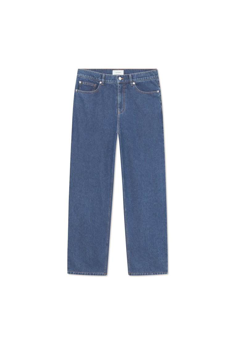 Sinine teksapüks, otsene jalgade lõige, viis taskut ja esine nööpkinnitus. Omab kerget pesu ja õrnu õmbluse detaile.